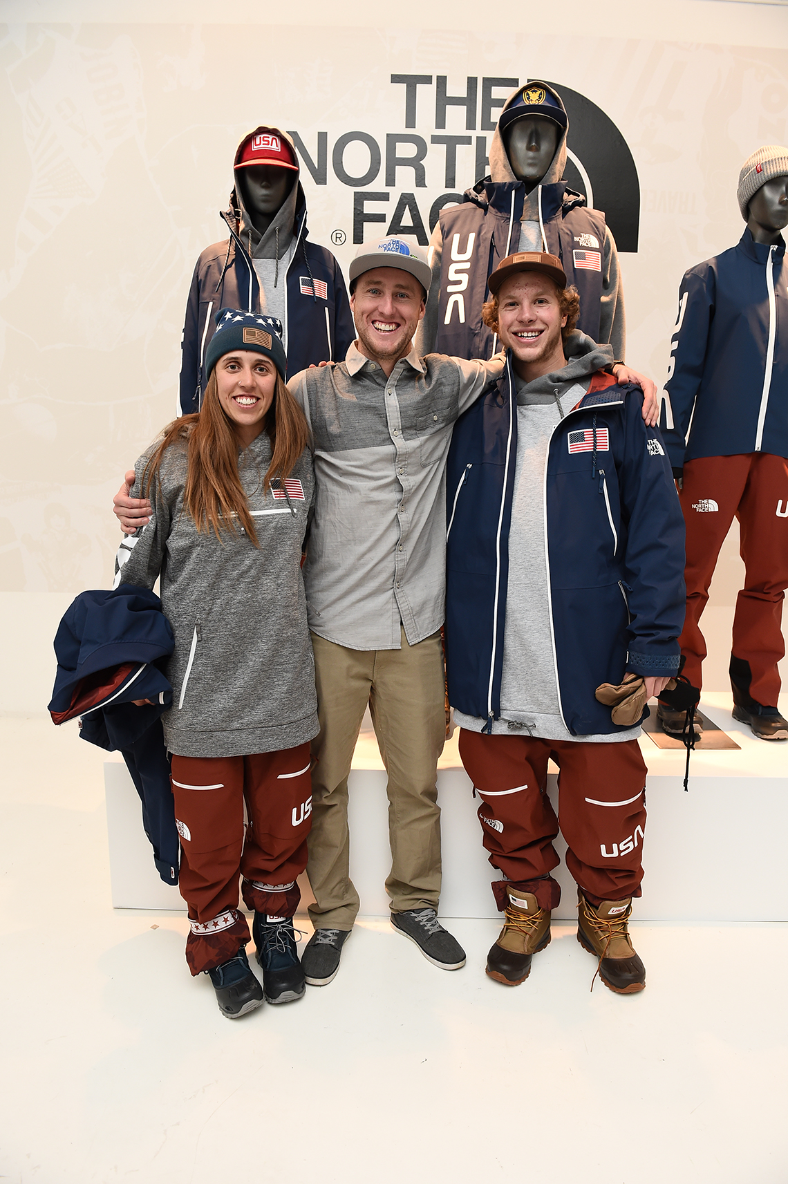 Long-time TNF athlete Tom Wallisch, center, is all smiles posing with Bowman, left, and Blunck, right.